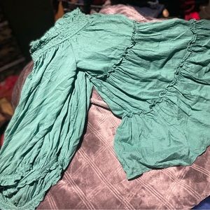 Beautiful turquoise flowy top by Free People